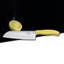 Кухонный нож Victorinox SwissClassic Santoku 6.8526.17L8B желтый